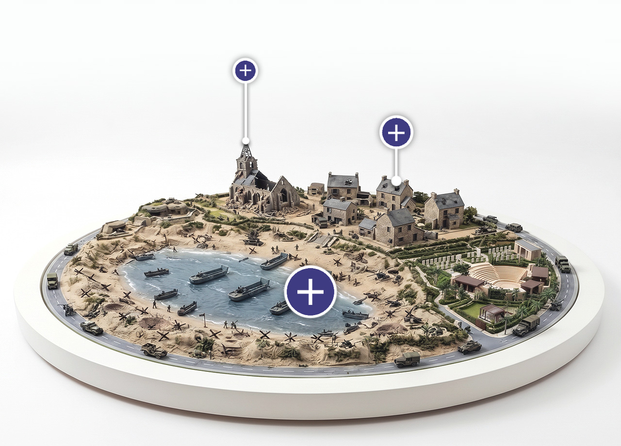 Maquette d'une plage du Débarquement avec barges, église en ruine, village et cimetière militaire